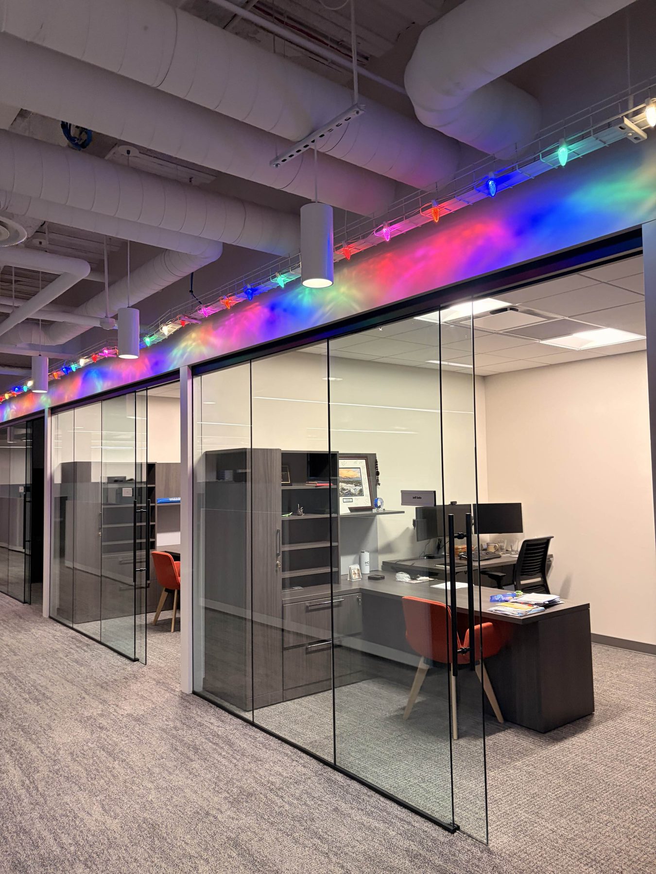 Interior glass office partition and sliding glass door cleaned streak-free in a downtown Salt Lake City professional office