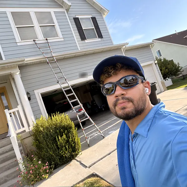 Mike from Nice Glass on a residential window cleaning job