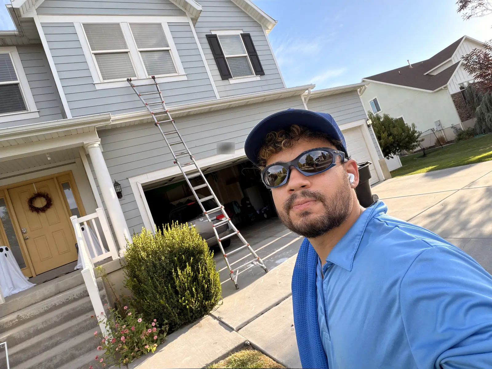 Mike from Nice Glass on a residential window cleaning job
