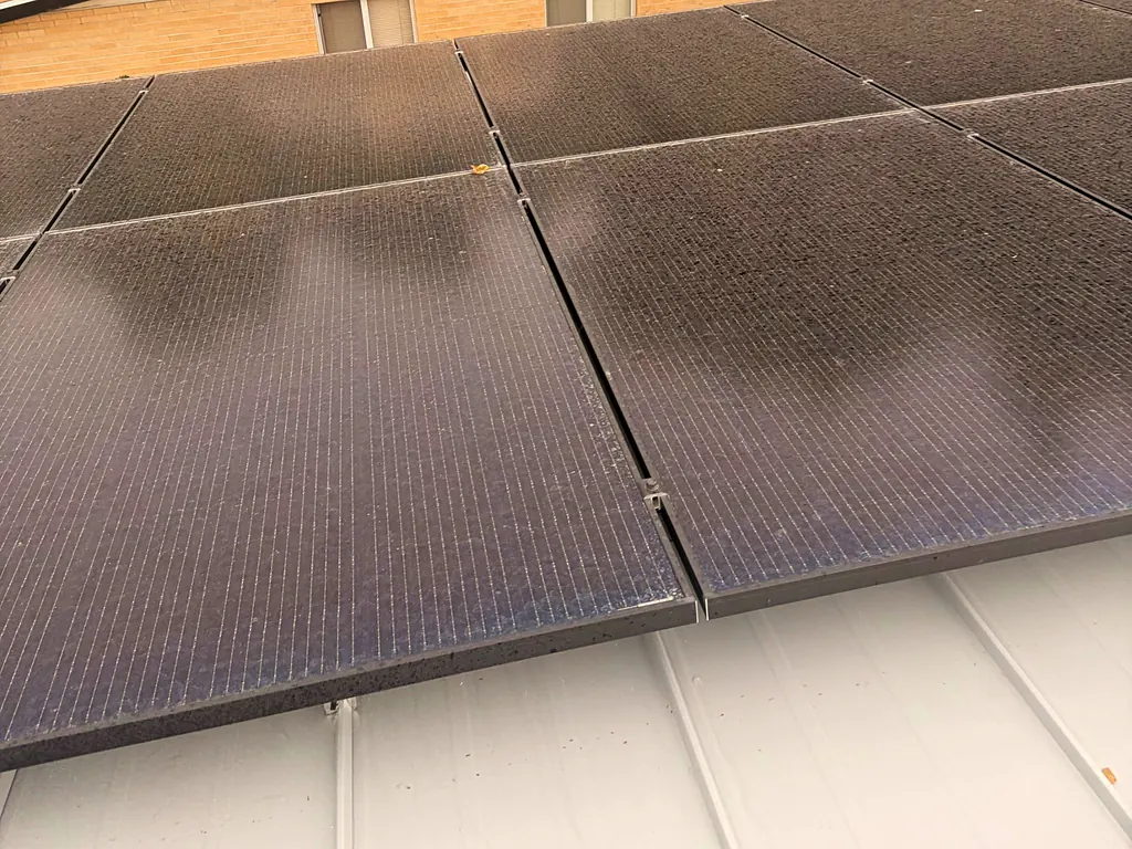Dusty solar panels before cleaning